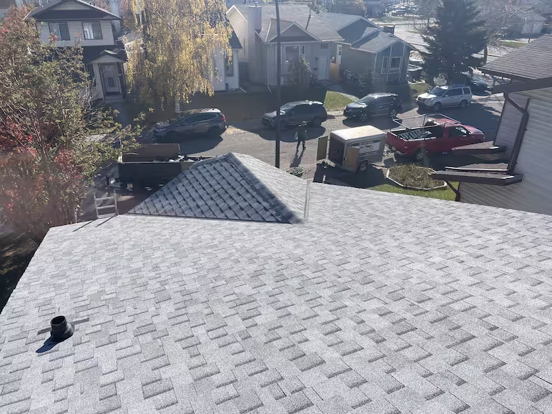 Professional asphalt roof installation project