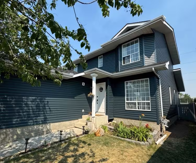 Complete siding replacement project in Calgary - professional installation by Right To The Peak