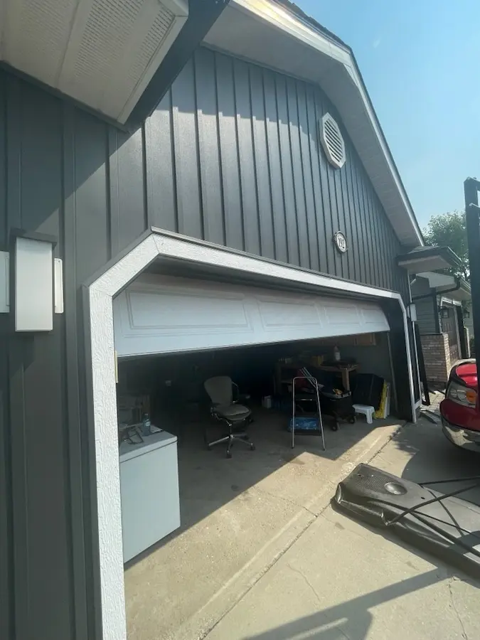 Premium wood siding installation on garage in Calgary by Right To The Peak