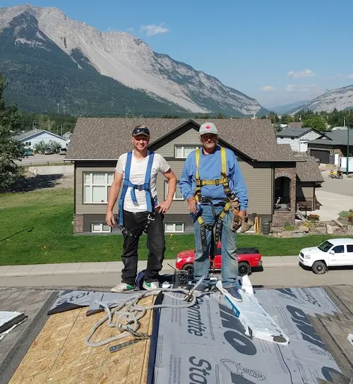 Joe and his father on a roofing job site
